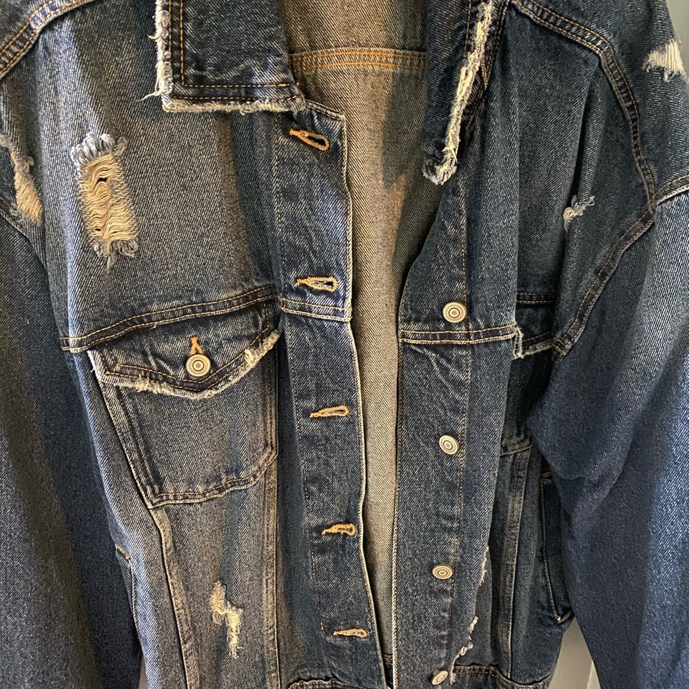 Distressed jean jacket cropped